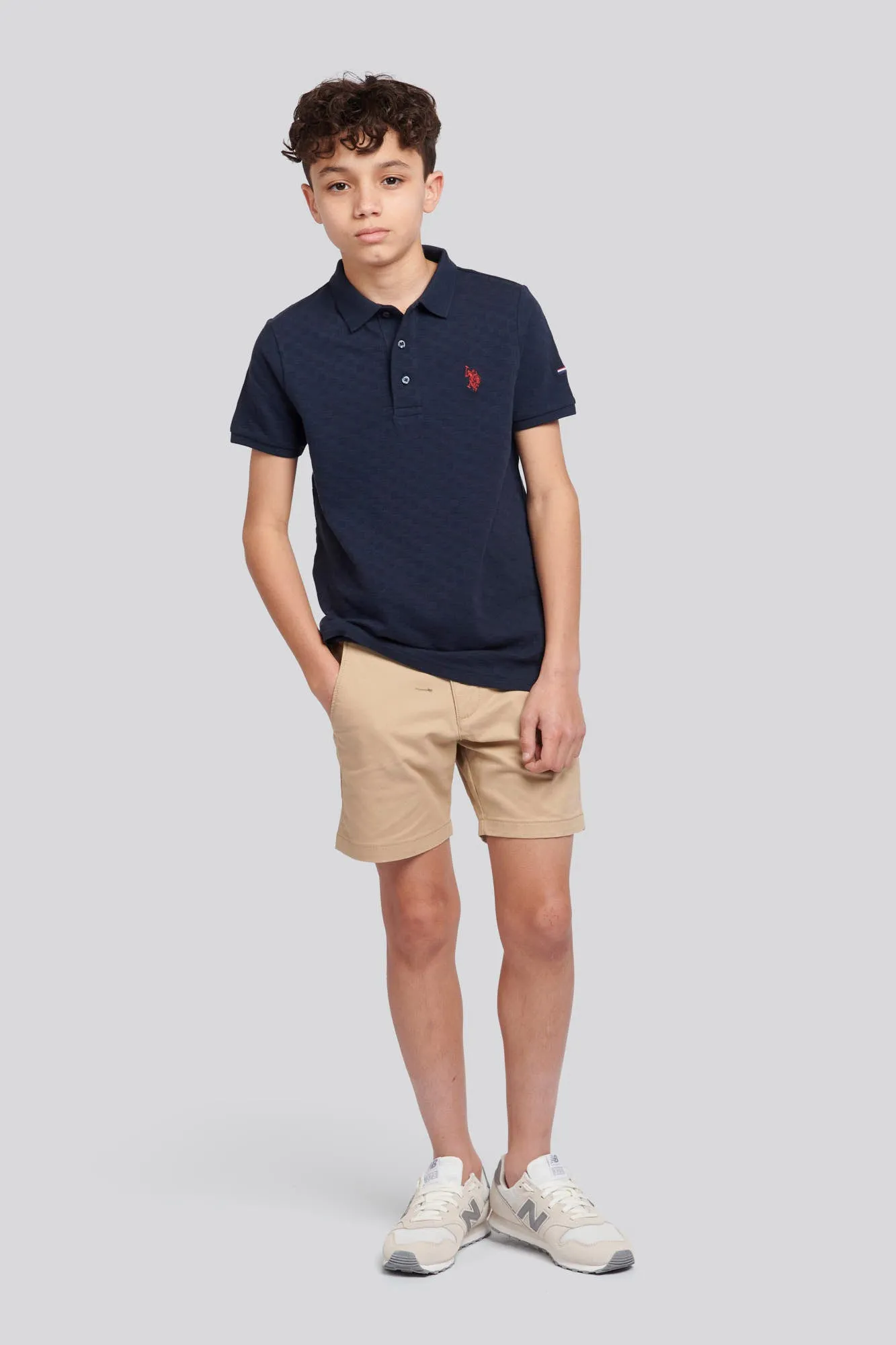 Boys Check Texture Polo Shirt in Dark Sapphire Navy / Haute Red DHM